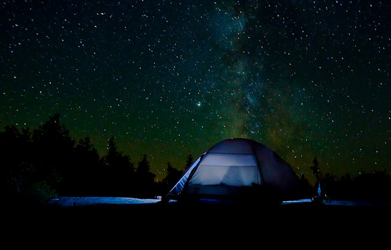 Camping in a tent under the stars